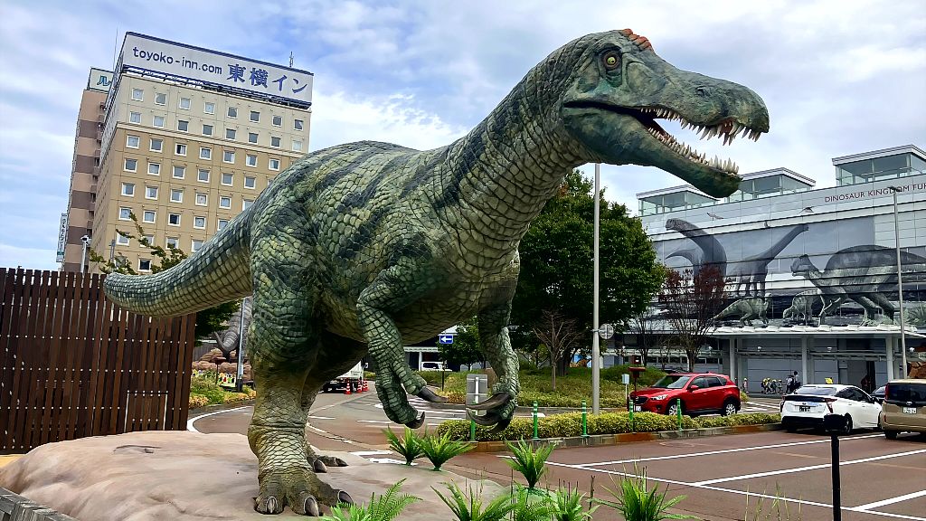 A dinosaur robot in front of Fukui Station