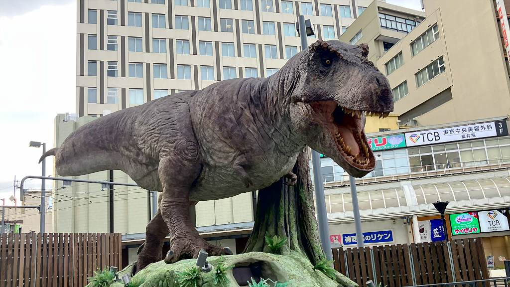 The Tyrannosaurus robot in front of Fukui Station